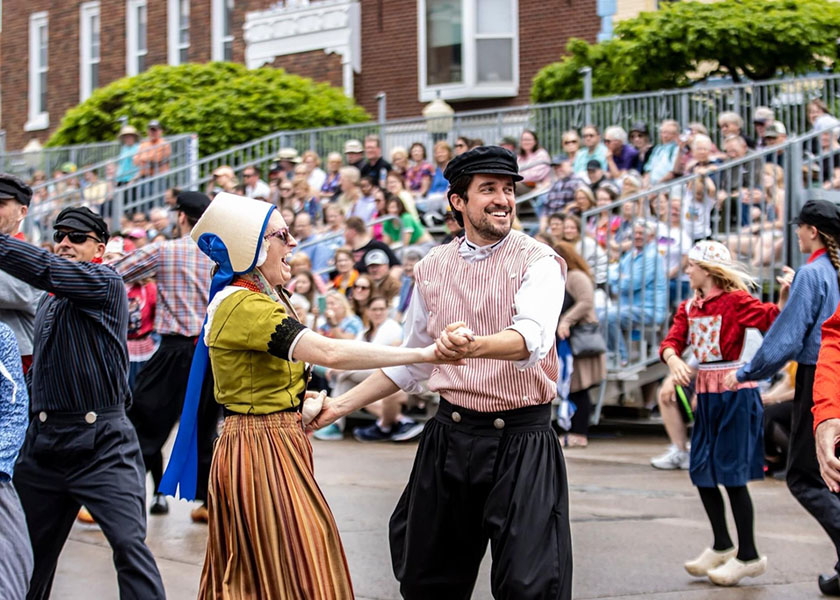 Carson Wealth Pella team members interacting with the community at the 2025 Tulip Time festival in Pella, Iowa.