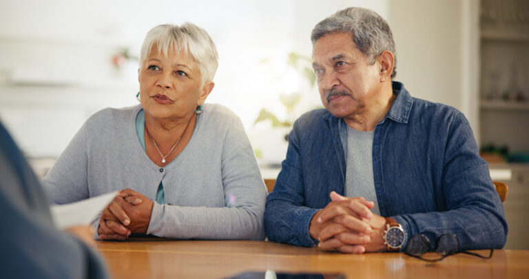 Mature man and woman with attorney for budget planning, paperwork or legal agreement together after inheriting a 401(k)